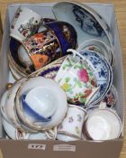 A quantity of assorted cups and saucers