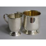 A George V silver christening mug, Chester, 1924 and a smaller modern silver christening mug, 6 oz.