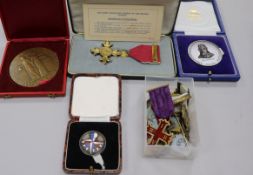 A cased OBE, a Festival of Britain medallion, two other medallions and a group of masonic jewels