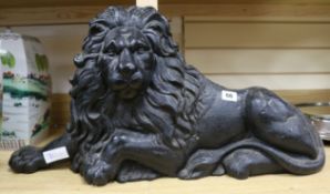 A cast iron lion length 69cm