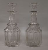 Two glass bell shaped decanters height 28cm