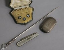 A silver vesta case, a French white metal meat skewer, a silver fruit knife and three cased