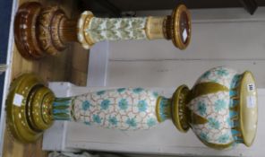 A Burmantofts green glazed jardiniere and two pedestals (3)