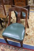 A set of six mahogany and leather dining chairs