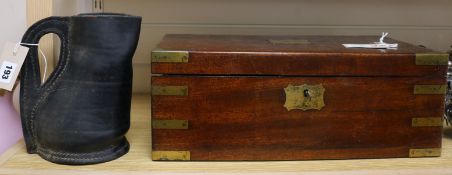 A Regency mahogany brass-bound writing slope and a leather black jack, the slope with owner's name