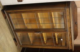 An Edwardian oak leaded bookcase W.94cm