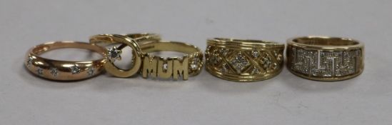 Four assorted 9ct gold and diamond set dress rings and one other 9ct gold and gem set ring. gross