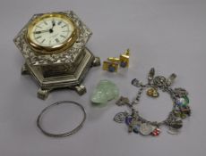 A ruby and diamond-set hinged bangle, a silver charm bracelet and sundries, including a pair of