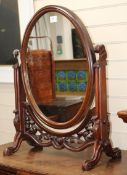 A Victorian carved mahogany toilet mirror W.62cm