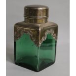 A late Victorian silver mounted green glass salts? jar and cover, marks rubbed, 15.5cm.