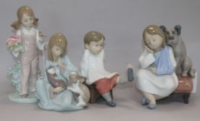 Four Lladro figures, boxed, to include Cat Nap, no. 5640, Spring, no. 5217, Talk to Me, no. 8168 and