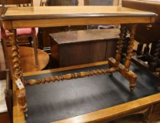 A mahogany barley twist stretcher table W.96cm