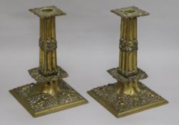 A pair of Charles II style cast brass candlesticks height 21cm