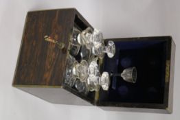 An Asprey's coromandel four-decanter box, fully-fitted, with liqueur glass and retailer's label 22 x