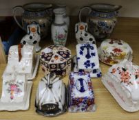 A pair of Keeling & Co Losol Ware toilet jugs, a collection of ceramic cheese dishes and sundries,