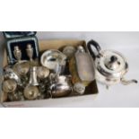 A group of silver and plated items, including a pair of silver peppers, cased, a pair of Victorian