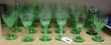 A collection of lime green glass wine glasses tallest 14cm