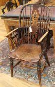 A Victorian ash and elm Windsor wheelback armchair and five standard chairs, various