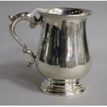 A George V silver baluster mug, Josiah Williams & Co, London, circa 1930, 10.4cm, 6 oz.