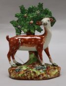 A pearlware figure of a deer, c.1820 height 15cm