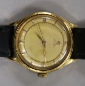 A gentlemen's 1940's Omega 18ct gold automatic wristwatch, having champagne dial with Roman numerals