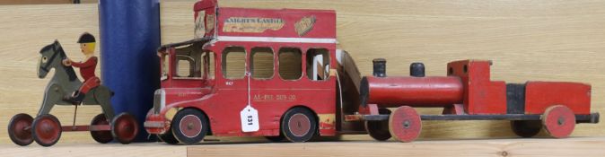 A scratchbuilt double-decker bus, two trains and a horse and rider longest 58cm