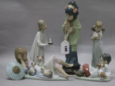 Five Lladro figures and two Swarovski animals, all boxed, the Lladro to include Japanese Girl with