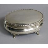 An Edwardian oval silver trinket box by Alexander Clark Manufacturing Co, Birmingham, 1907, width