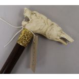 A late Victorian gold plated mounted carved ivory double dogs head handle walking stick length 88cm