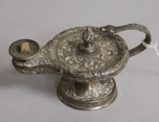 An Edwardian engraved silver club lighter, modelled as a lamp with serpent handle, London, 1905,