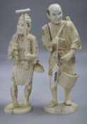 Two Japanese sectional ivory figures of farmers, early 20th century, 25 and 25.5cm