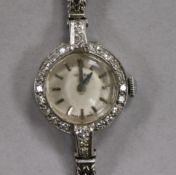 A lady's 1960's 18ct white gold and diamond set Vertex manual wind cocktail watch, on a 9ct white