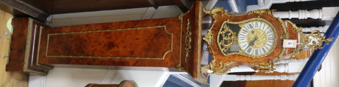 A Louis XV style burr walnut and gilt metal-mounted pedestal clock, striking on gong, on matching