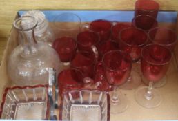 A quantity of Victorian cranberry glassware, a clear glass pickle jar, a decanter, etc.