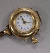 A 14ct gold wrist watch, (converted fob watch?).