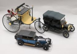 A model of a Benz Motorwagon and two models of veteran cars tallest 17.5cm