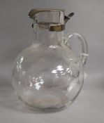 A stylish Edwardian silver mounted glass claret jug, Hukin & Heath, Birmingham, 1907, 17cm.