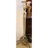 A brass standard lamp W. of base approx. 50cm