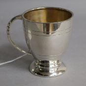 A 1960's silver christening mug, J.B. Chatterley & Sons Ltd, Birmingham, 1960, 78mm, 3 oz.