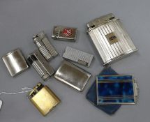 A Dunhill lighter, two others and a 1930's enamel compact