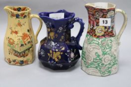 A Mason's ironstone mazzarine blue hydra jug c.1815 and two other Mason's ironstone jugs tallest