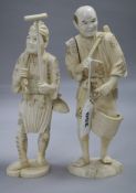 Two Japanese sectional ivory figures of farmers, early 20th century, 25 and 25.5cm