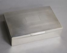 A 1960's engine turned silver rectangular cigarette box, Birmingham, 1964, 17cm.