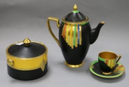 A Carlton Ware Art Deco jar and cover and a similar coffee pot and a coffee cup and saucer pattern