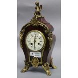 A Louis XVI style tortoiseshell and ormolu mantel clock height 37cm