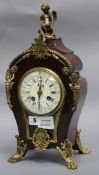 A Louis XVI style tortoiseshell and ormolu mantel clock height 37cm