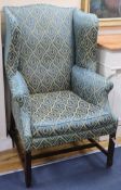 A George III wingback armchair