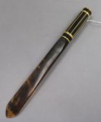 An 18ct gold mounted tortoiseshell page turner length 26cm