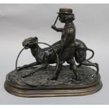 After J Moignez. A bronze of a boy and a greyhound, height 25cm