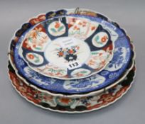 Three Japanese Imari dishes and a blue and white example largest diameter 31cm